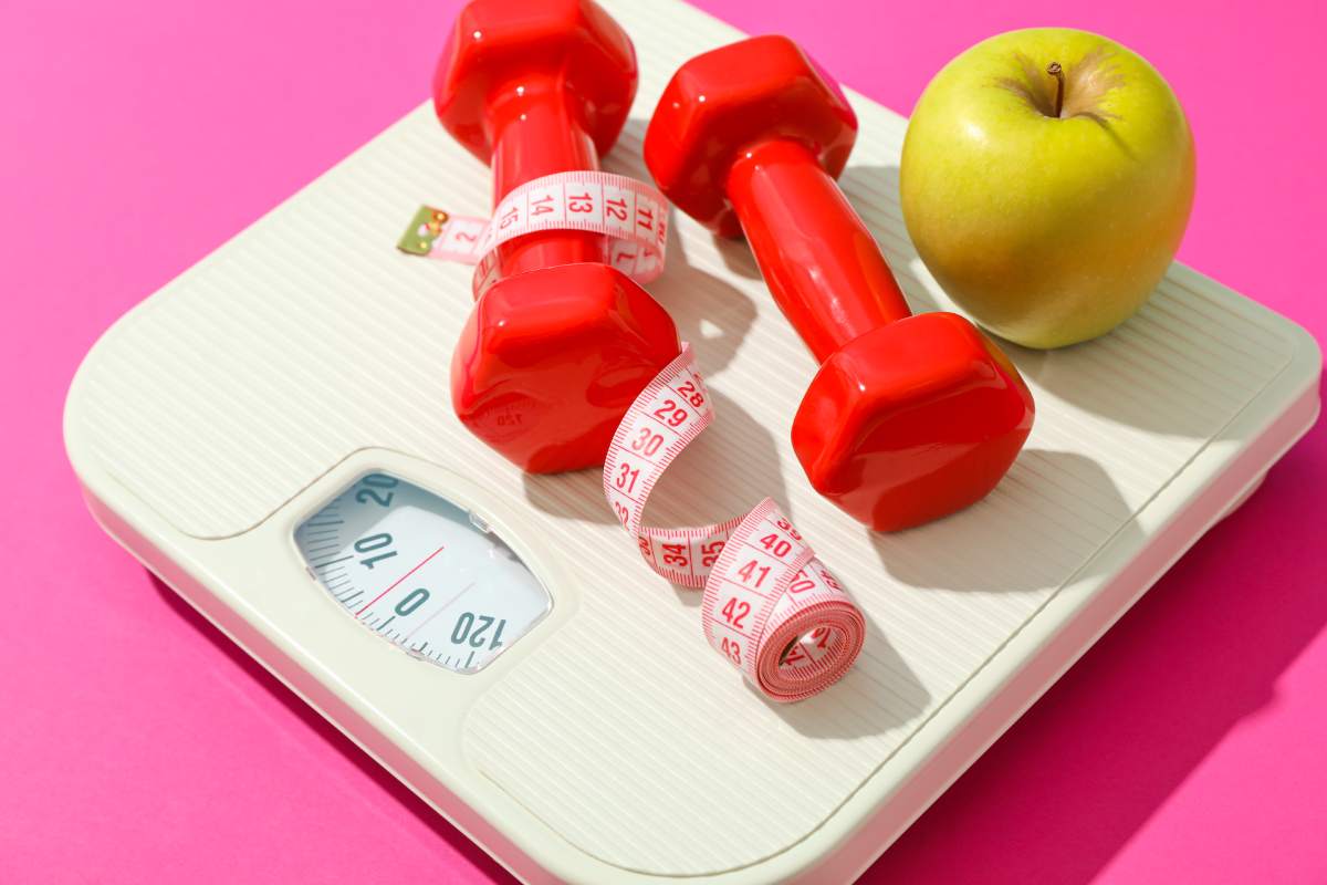 weigh scales apple dumbbells and measuring tape 2023 11 27 05 29 40 utc 1